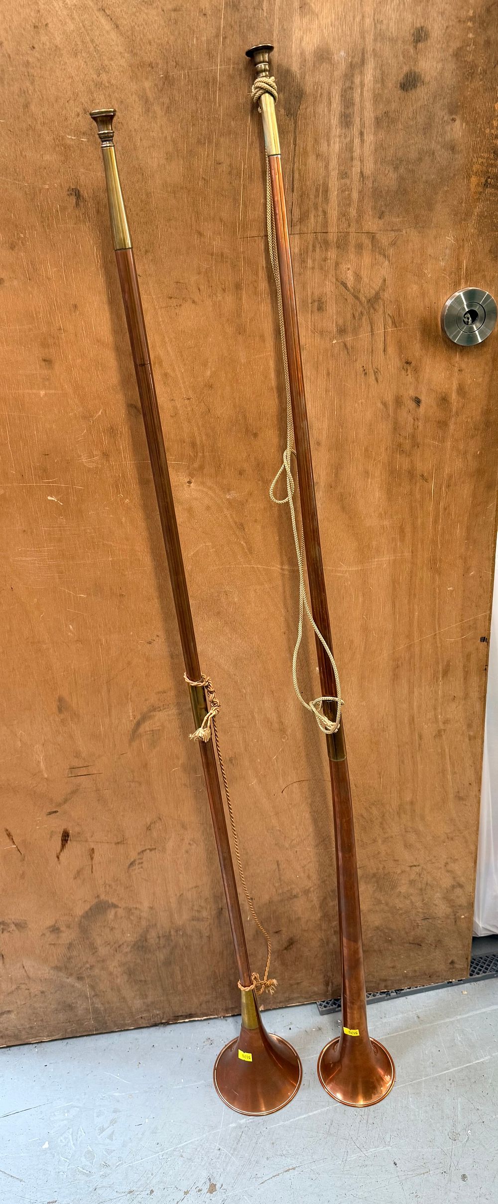 Lot 544: A Pair of 19th Century? Copper and Brass Coaching Horns with Braided Cordage