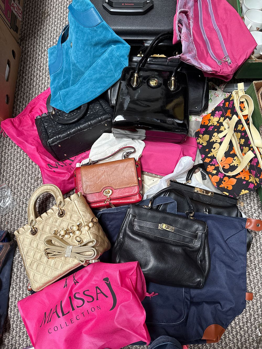 Lot 547: Samsonite and Malissa J? Collection of Handbags and Luggage