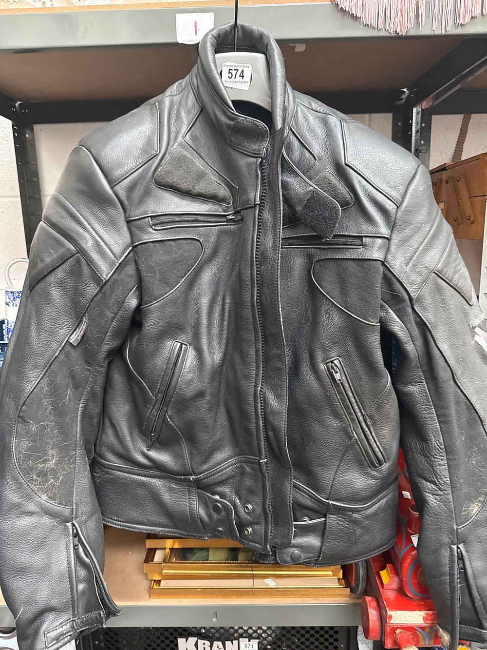 Lot 574: Frank Thomas Pebbled Leather Motorcycle Jacket, Size 44 / 54