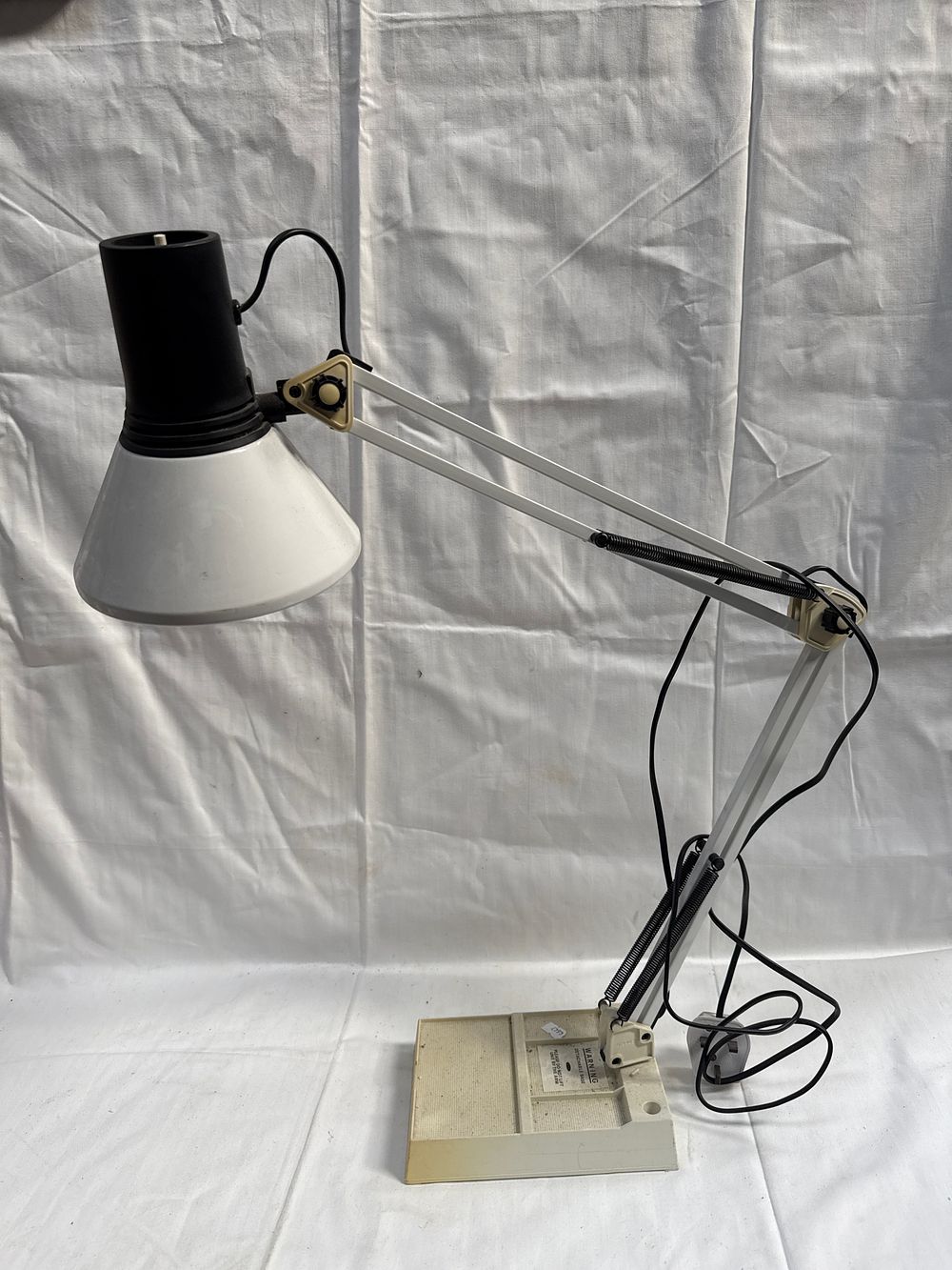 Lot 579: A Metal and Plastic Adjustable Architect Style Desk Lamp