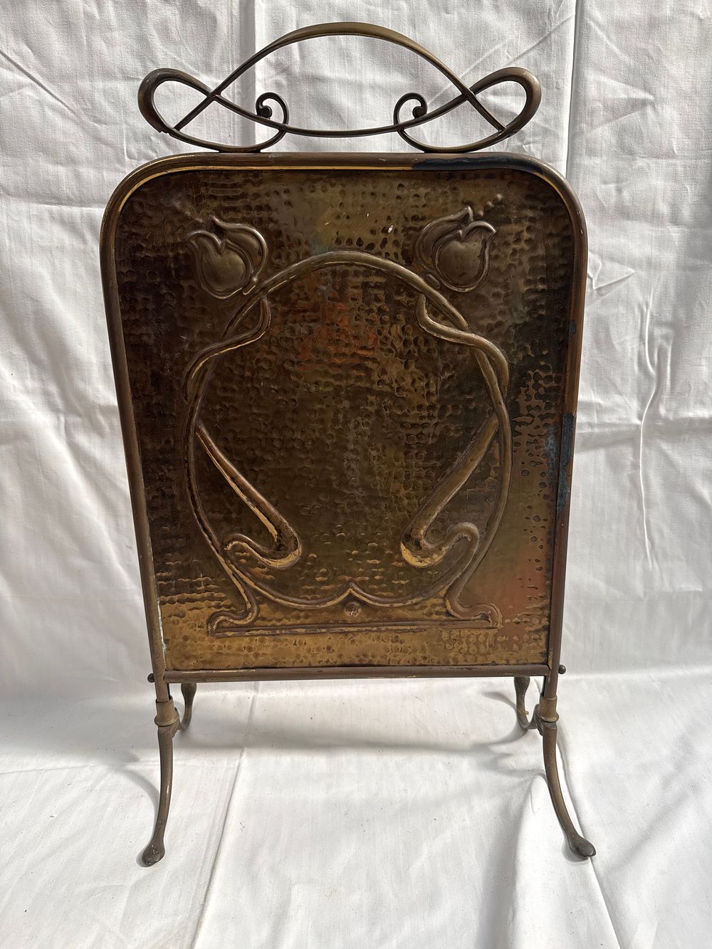 Lot 583: An Art Nouveau Copper? and Brass Fire Screen