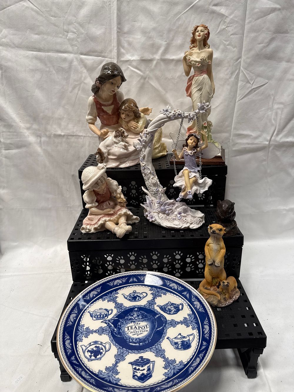 Lot 617: Five Ceramic, Bisque? and Resin? Figurines and One Blue and White Transfer-Printed Collector's Plate