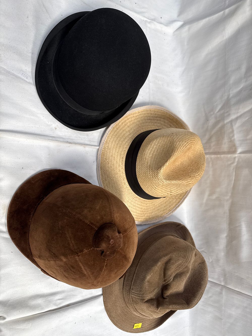 Lot 628: A Collection of Mid-20th Century? Felt, Straw and Velvet Hats and a Hunting Crop
