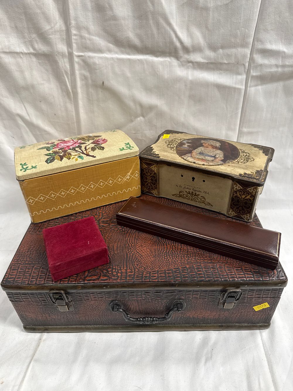 Lot 639: A Collection of Vintage Faux-Crocodile Effect and Lithographed Storage Containers