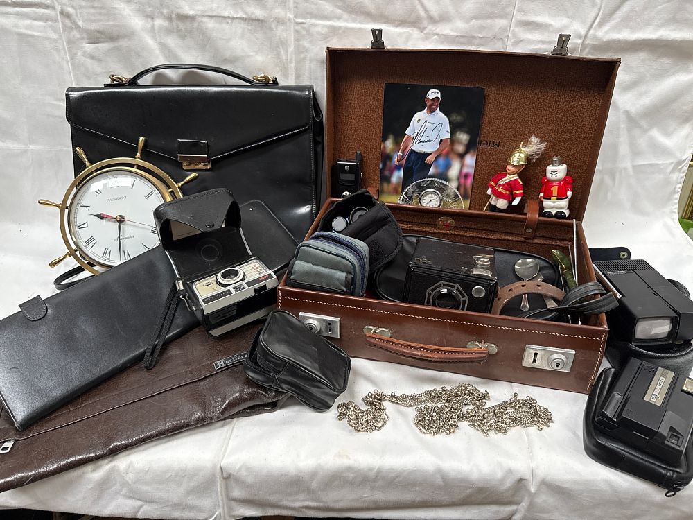 Lot 644: A Collection of Vintage Cameras, Portable Electronics, and Leather Travel Goods