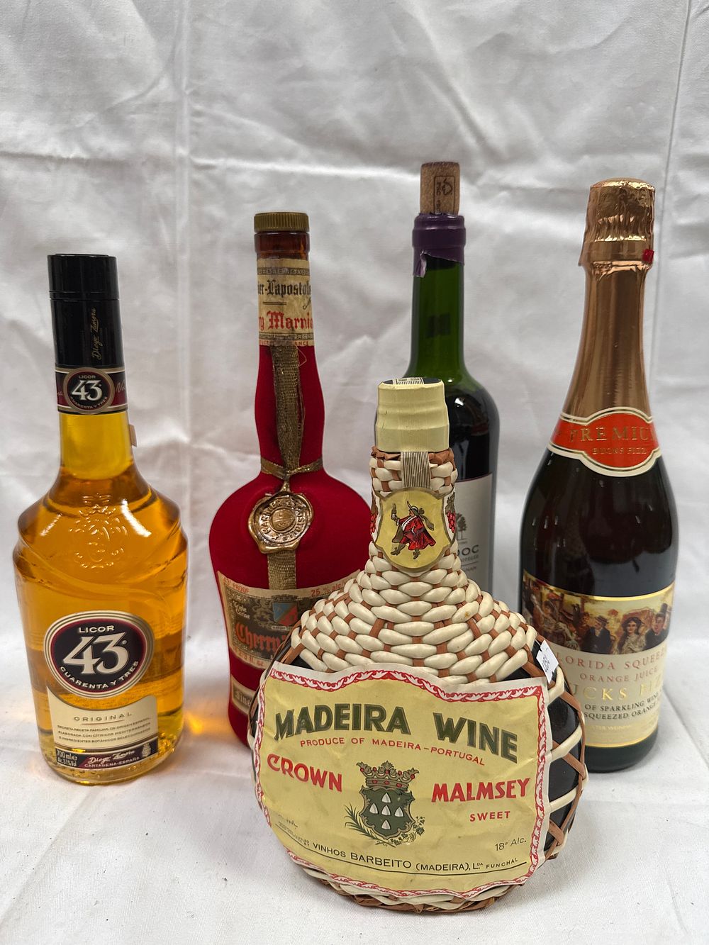 Lot 647: An Assortment of Wines and Spirits including Vinhos Barbeito Crown Malmsey Madeira and Licor 43