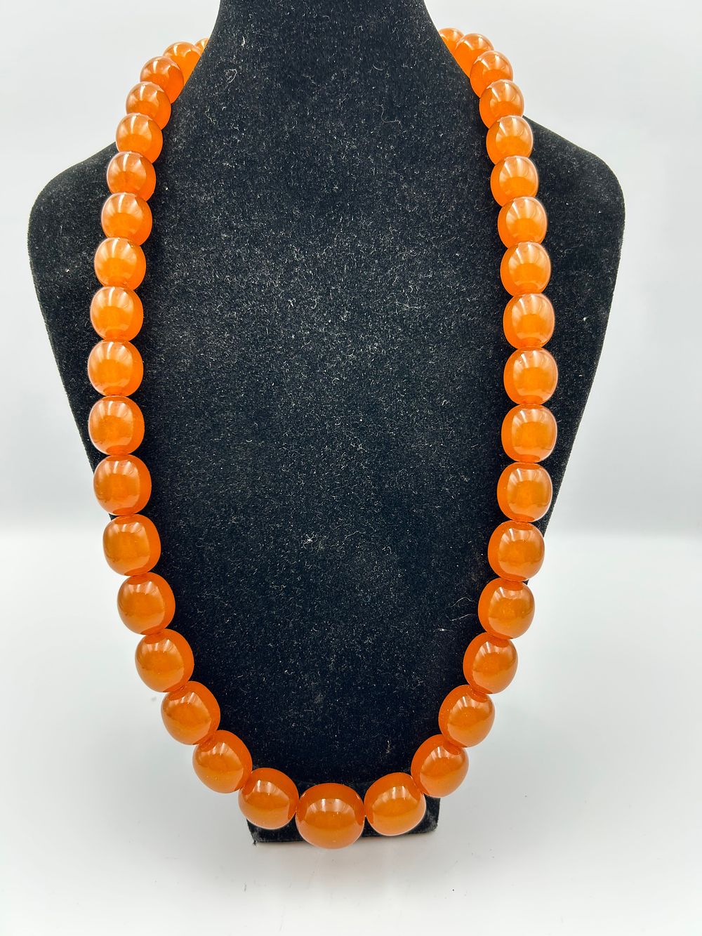 Lot 810: Vintage Baltic Amber? / Carnelian? Graduated Lentil Bead Necklace