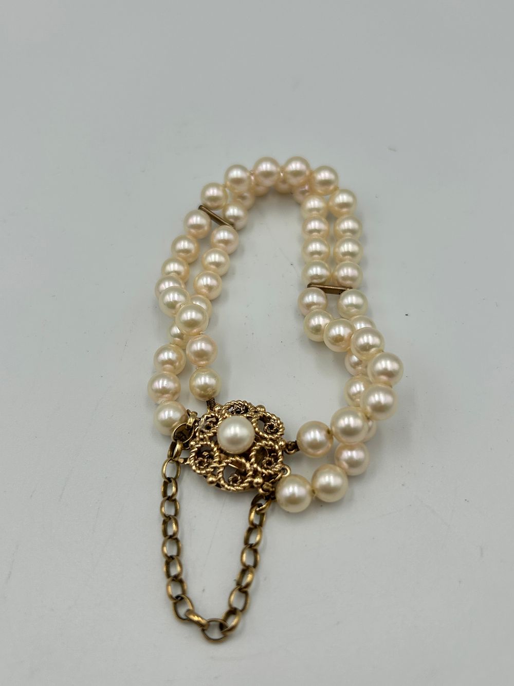 Lot 814: Late 20th Century 9ct Gold and Pearl Double Strand Bracelet, Birmingham