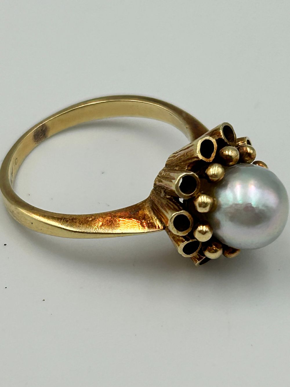 Lot 830: A Mid-Century? 14 Carat Yellow Gold and Pearl Cocktail Ring, Size P, 5.38g