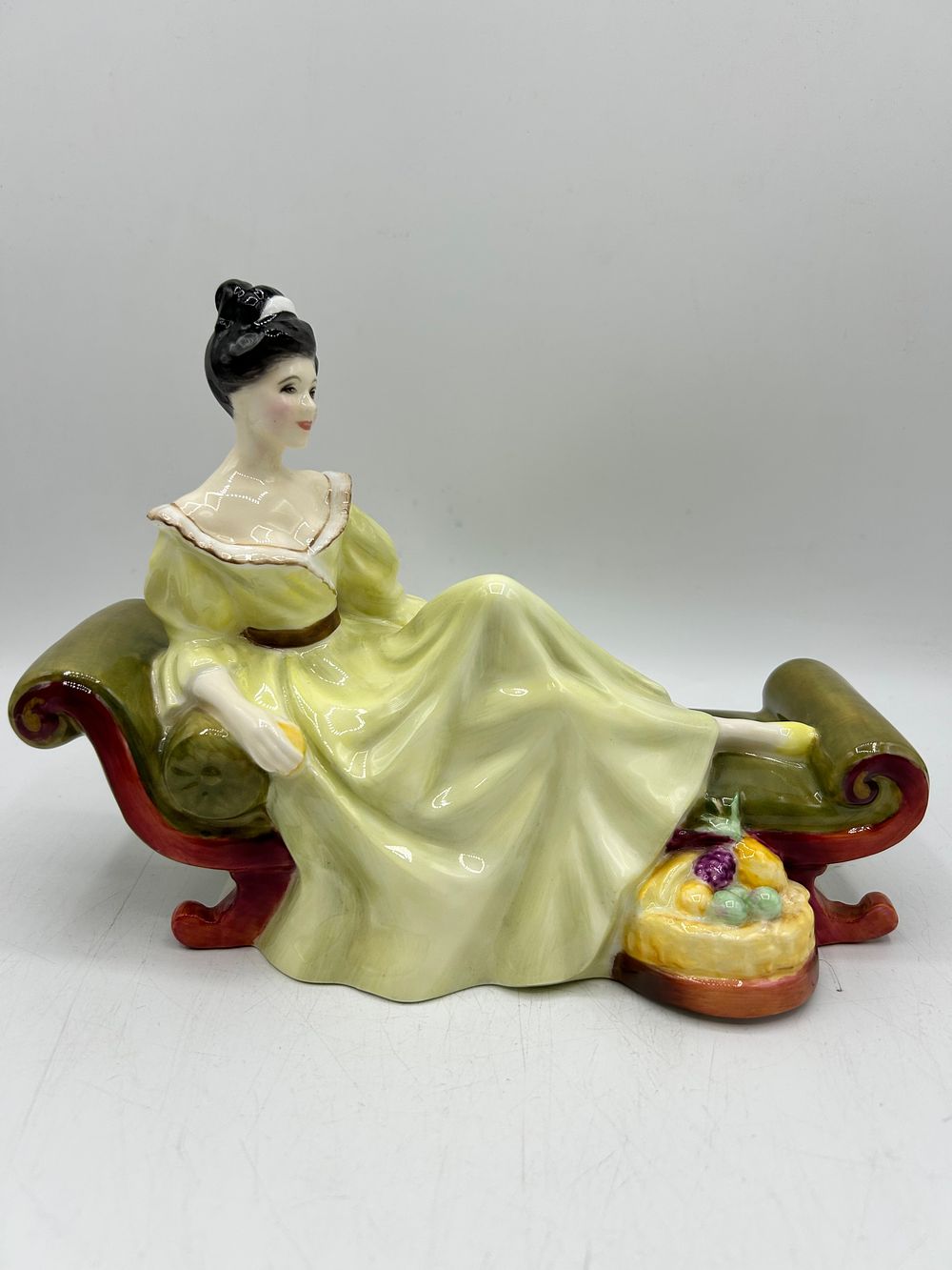 Lot 853: Royal Doulton Bone China Figurine At Ease H.N. 2473, 1972