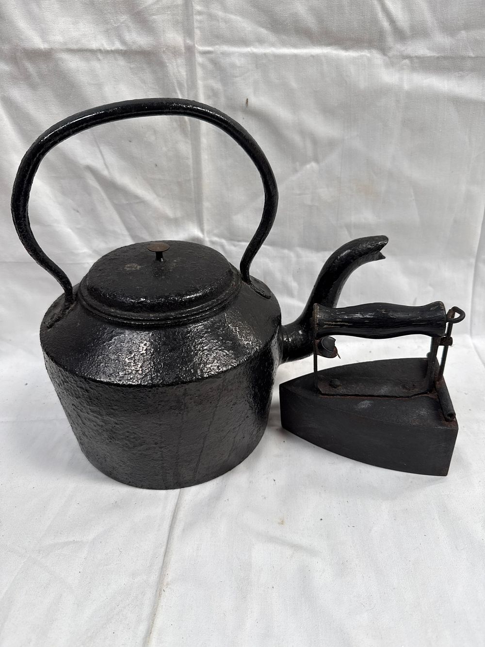 Lot 912: A Late 19th Century? Cast Iron Kettle and Sad Iron