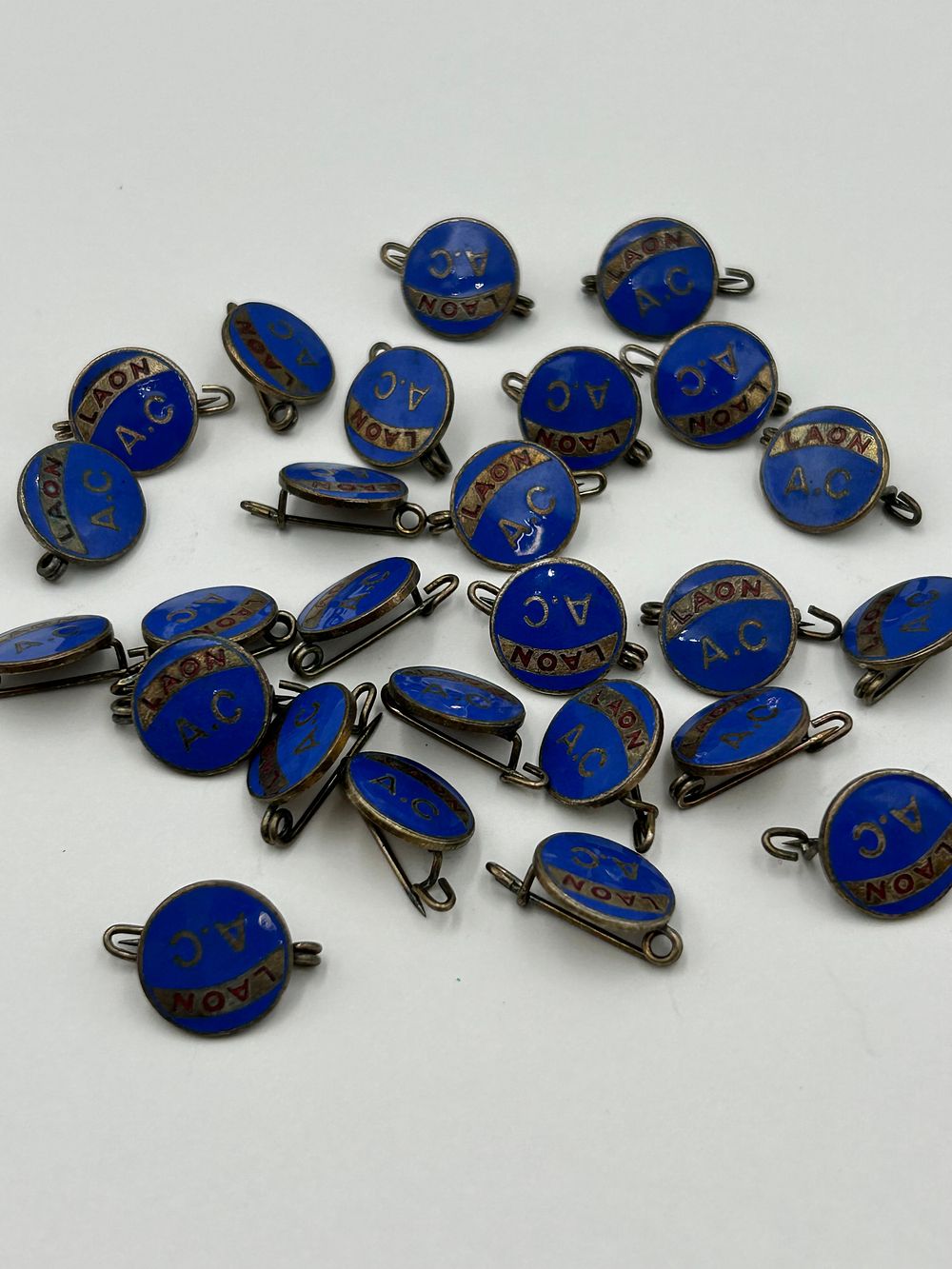 Lot 926: Vintage Gilt Metal Effect and Enamel A.C. Laon Club Insignia by Arthus-Bertrand