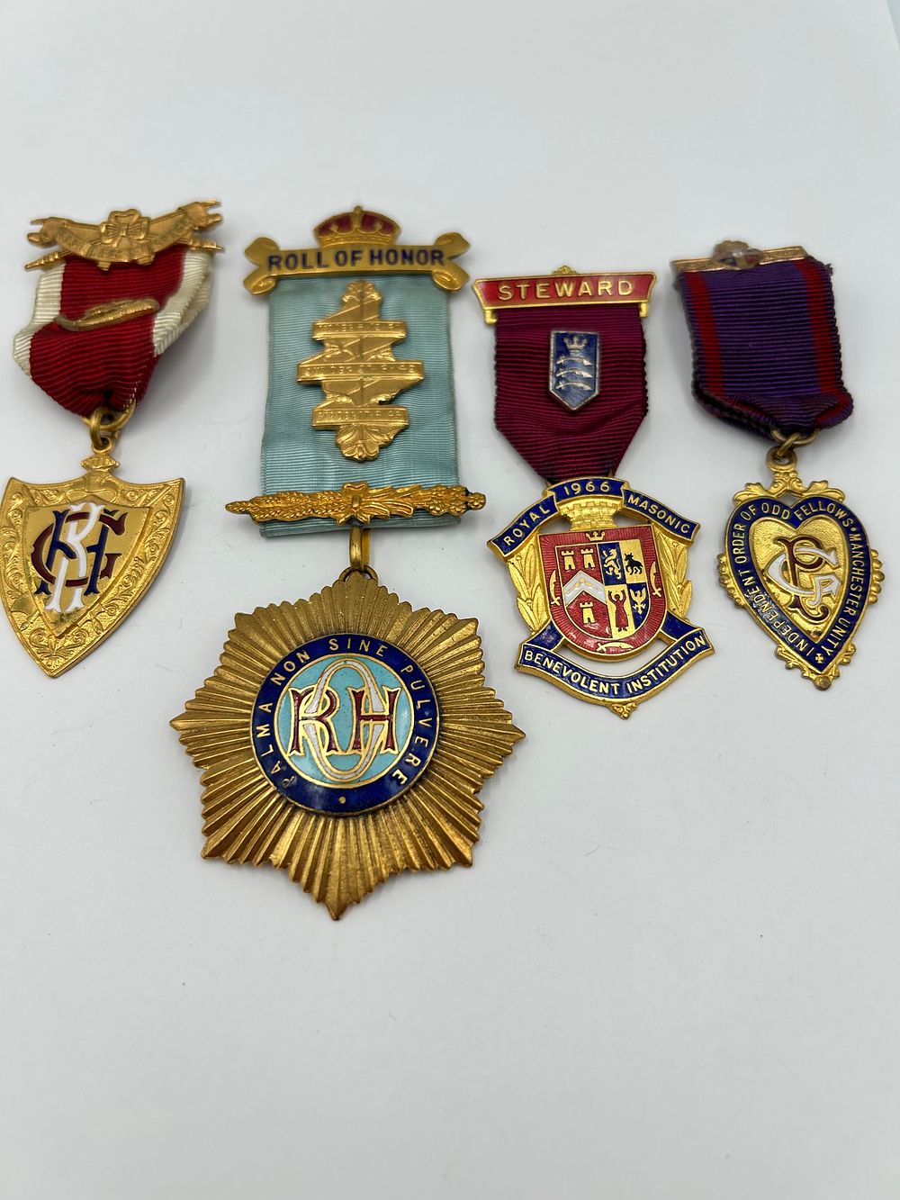Lot 928: A Collection of Gilt-Metal Effect and Enamelled Fraternal Society Jewels, Mid-20th Century