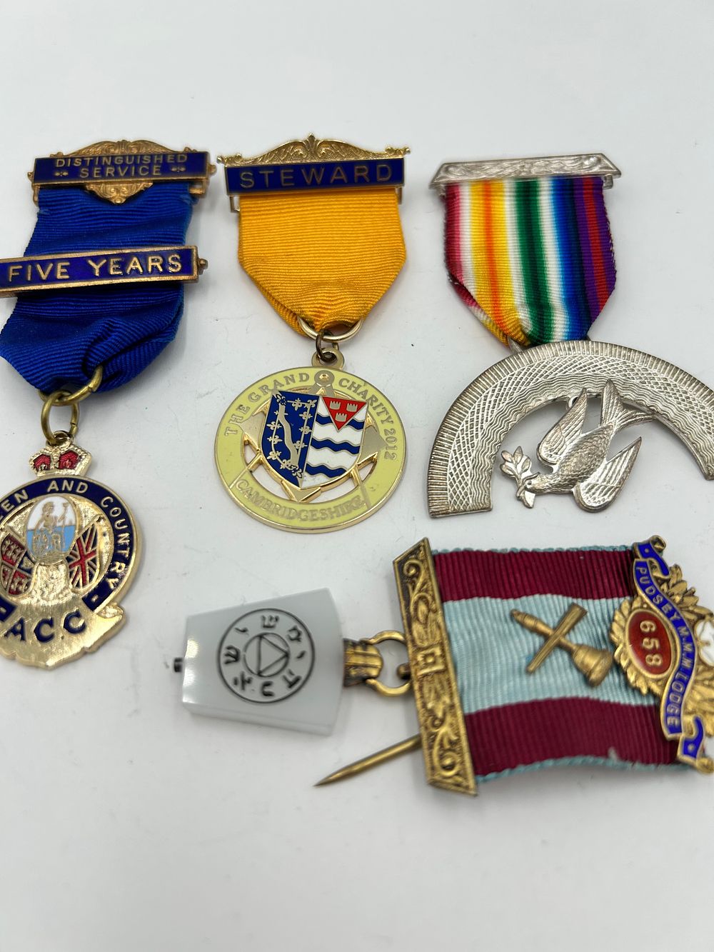 Lot 933: A Collection of 20th Century and Later Fraternal and Military Gilt-Metal Effect Medals
