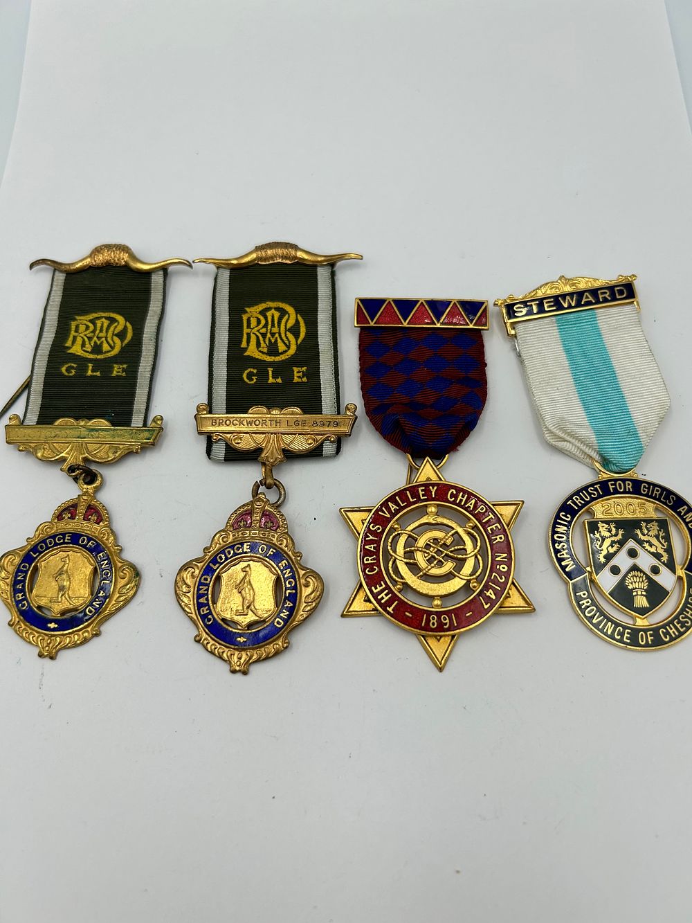 Lot 934: A Collection of Gilt Metal Effect and Enamel Fraternal Jewels, Late 19th and Early 21st Century