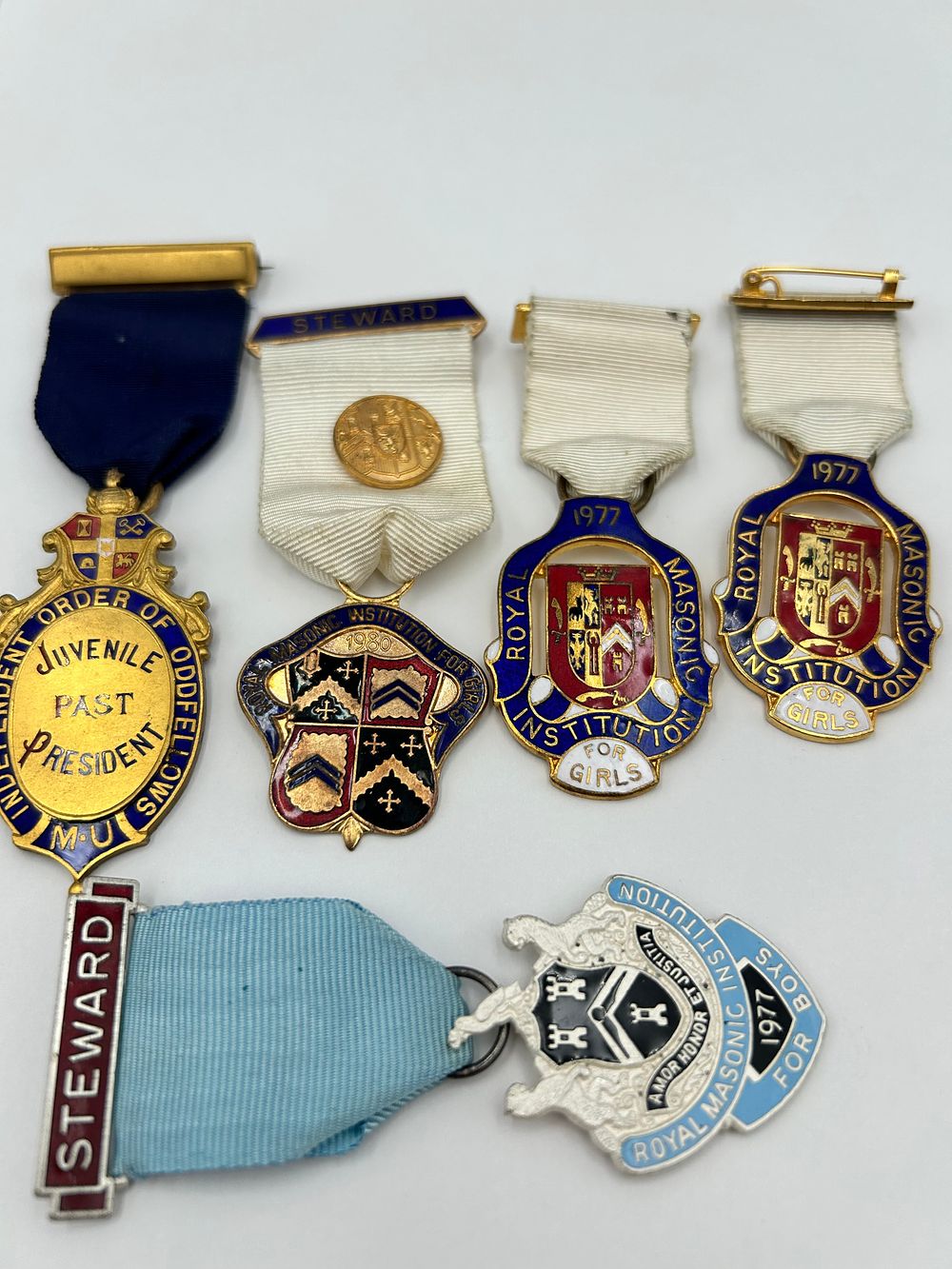 Lot 936: Late 20th Century White Metal? and Enamel Fraternal Jewels, 1977 and 1980
