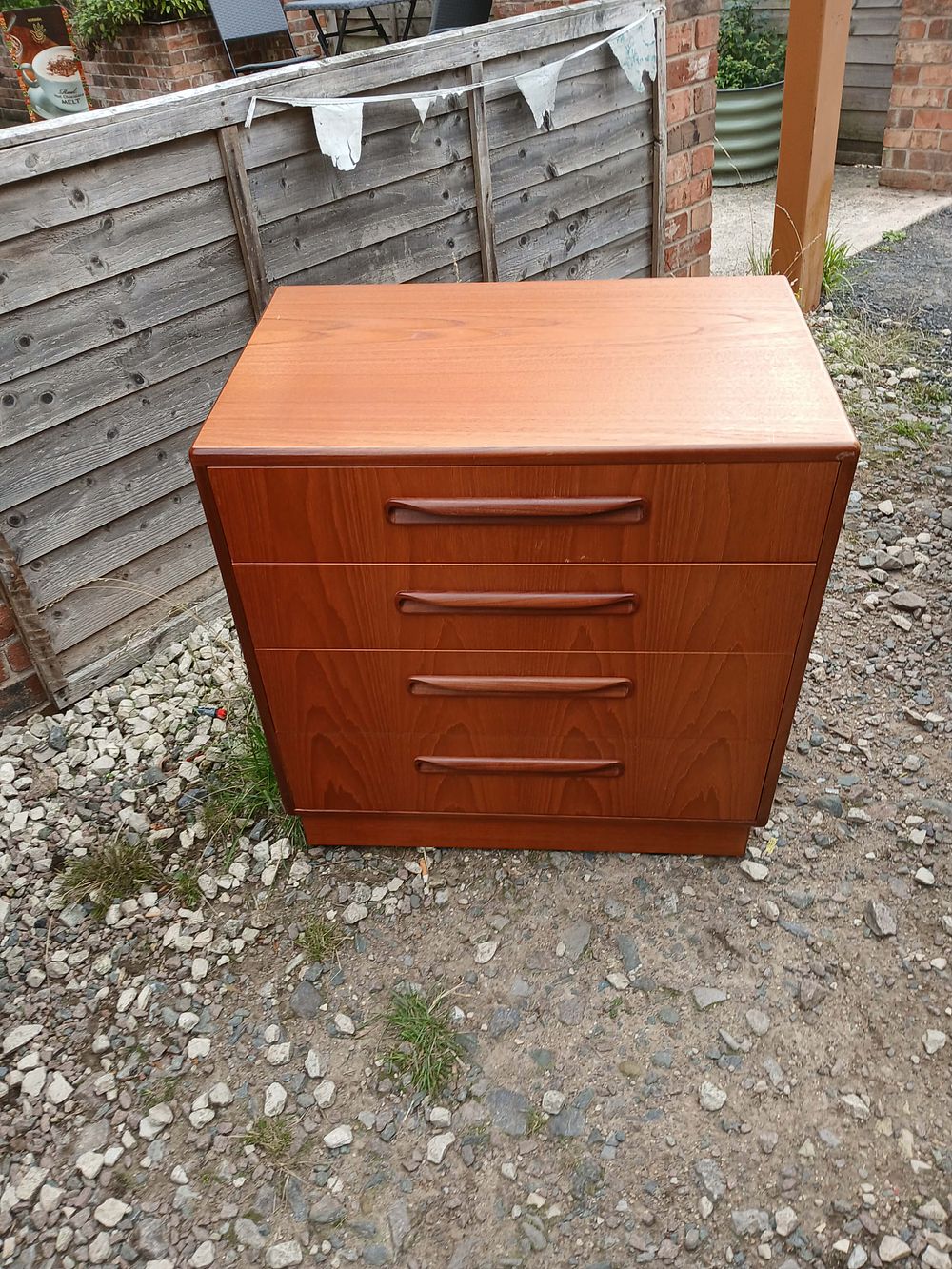 Lot 972: Mid-Century Modern Teak Veneered Chest of Four Drawers