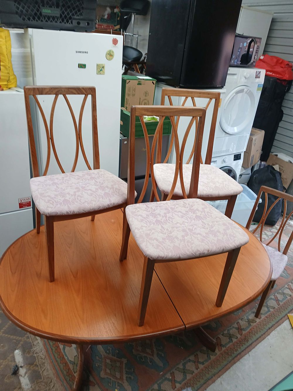Lot 973: Mid-Century Teak Extending Dining Table and Four Chairs by G-Plan?