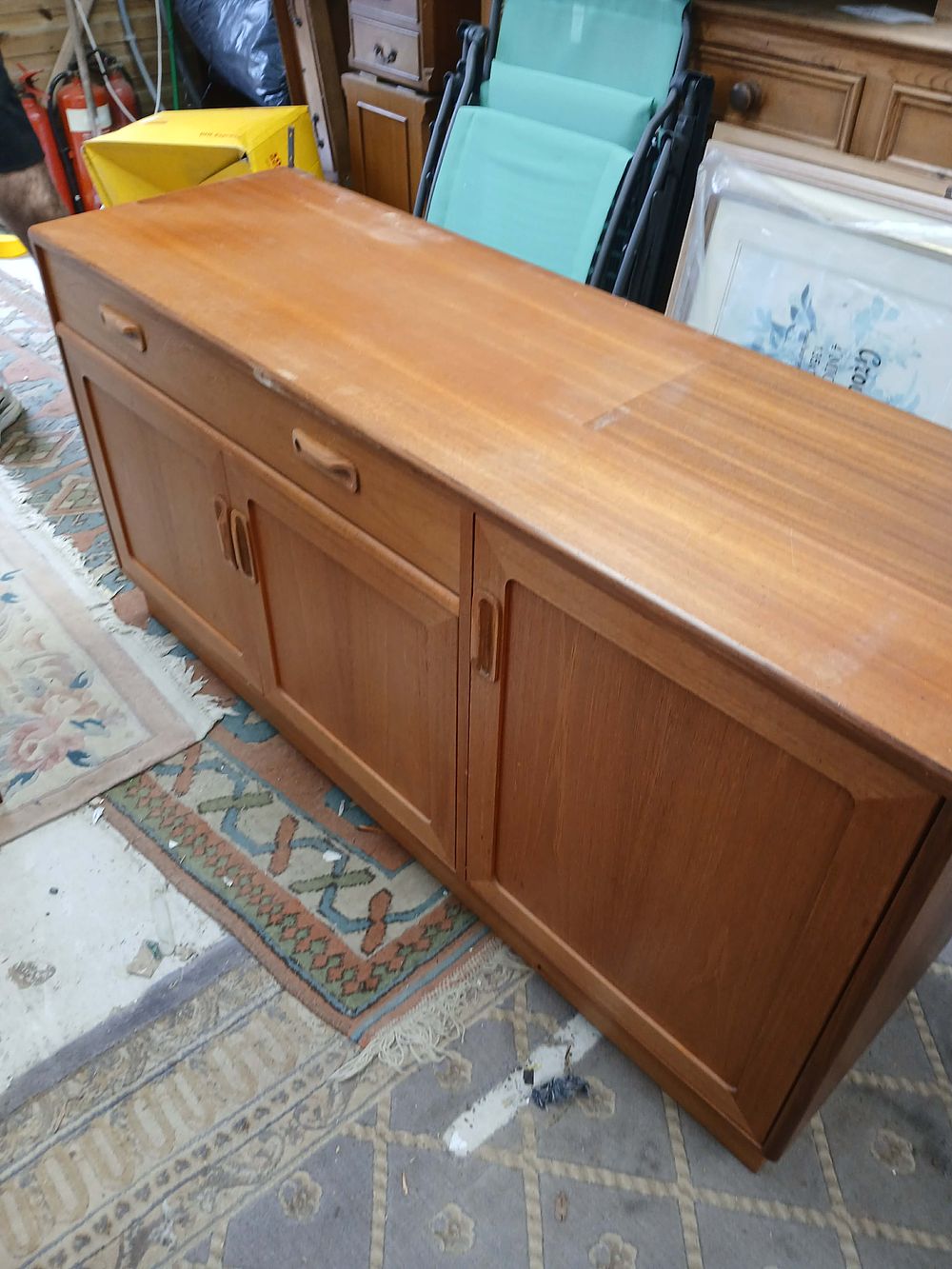 Lot 974: A Mid-Century? Teak Sideboard with Recessed Handles and Plinth Base