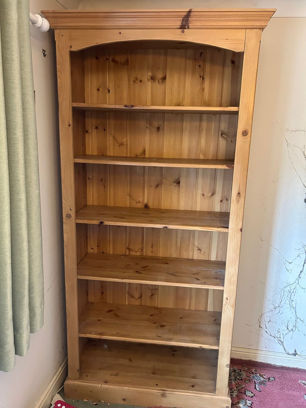 Lot 983: A country style solid pine narrow bookcase