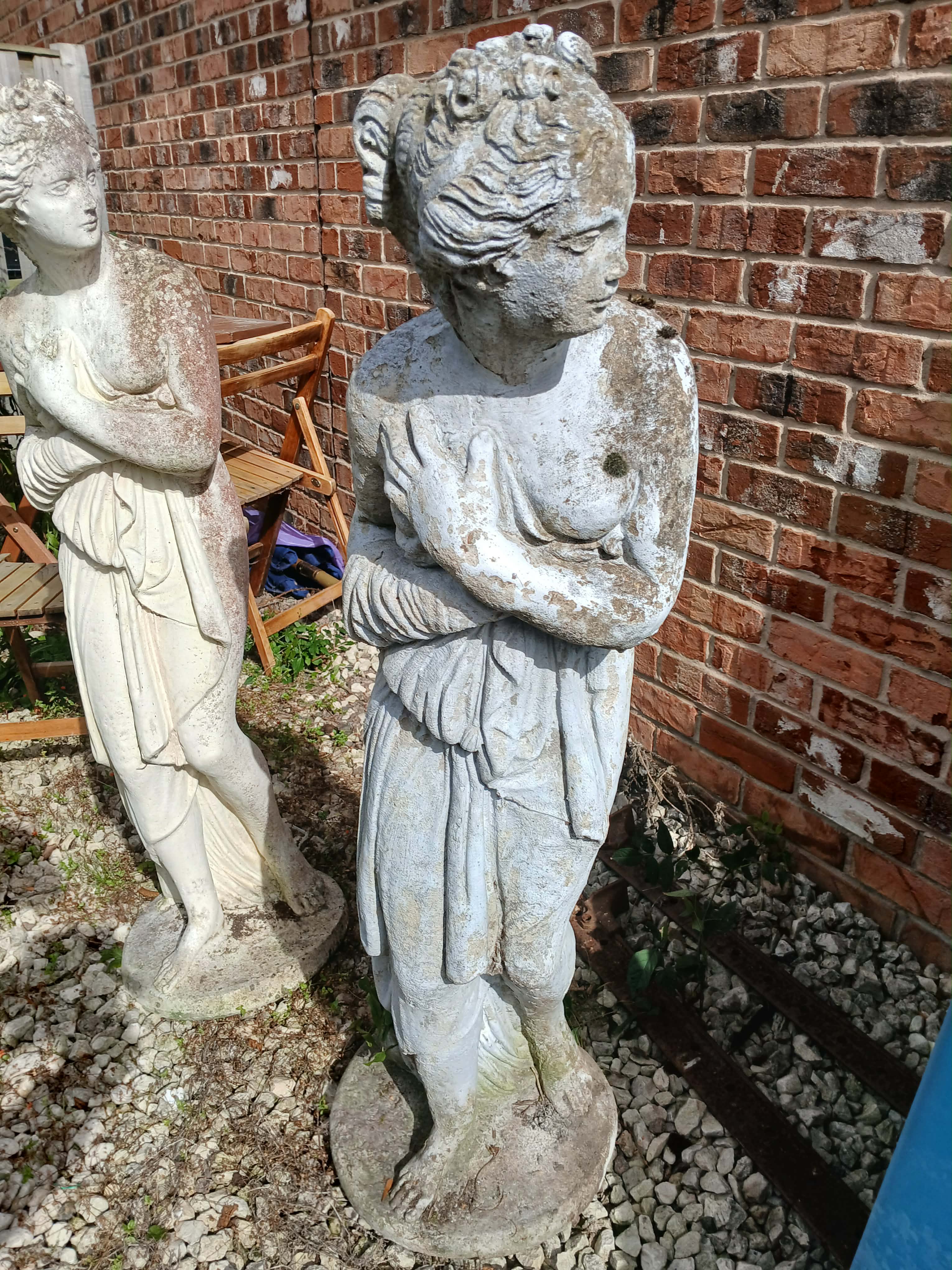 A Pair of Neoclassical Style Cast Stone Standing Female Figures