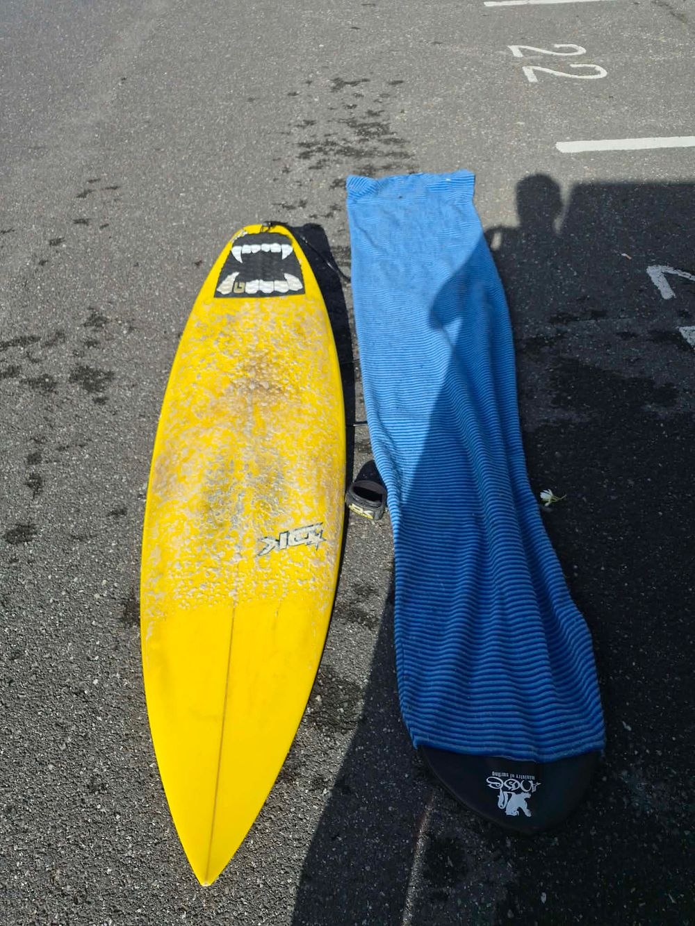 Lot 38: NSP Yellow Shortboard Surfboard and Anose Fabric Sock