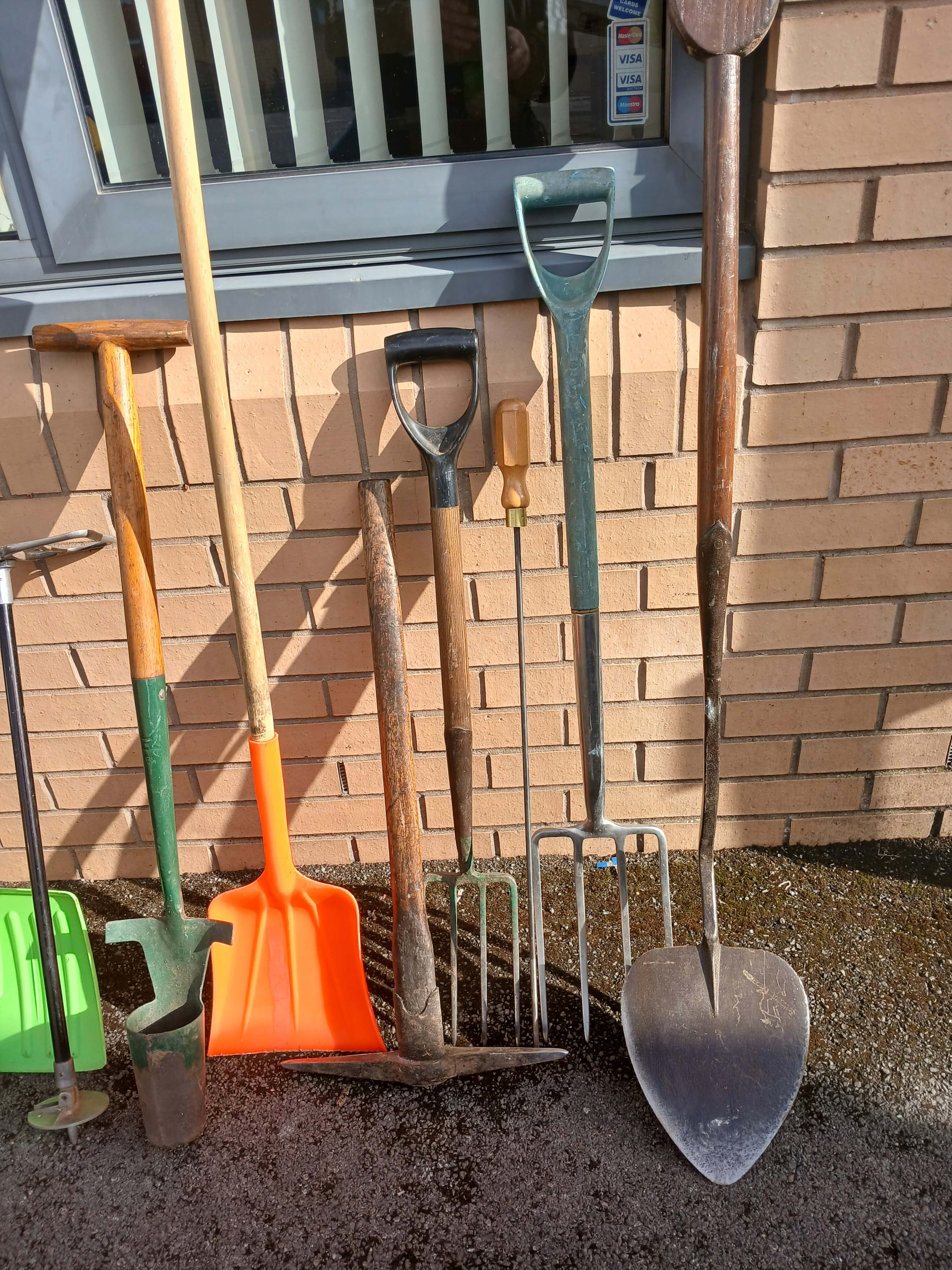 An Assortment of Manual Landscaping, Gardening, and Ground Maintenance Tools