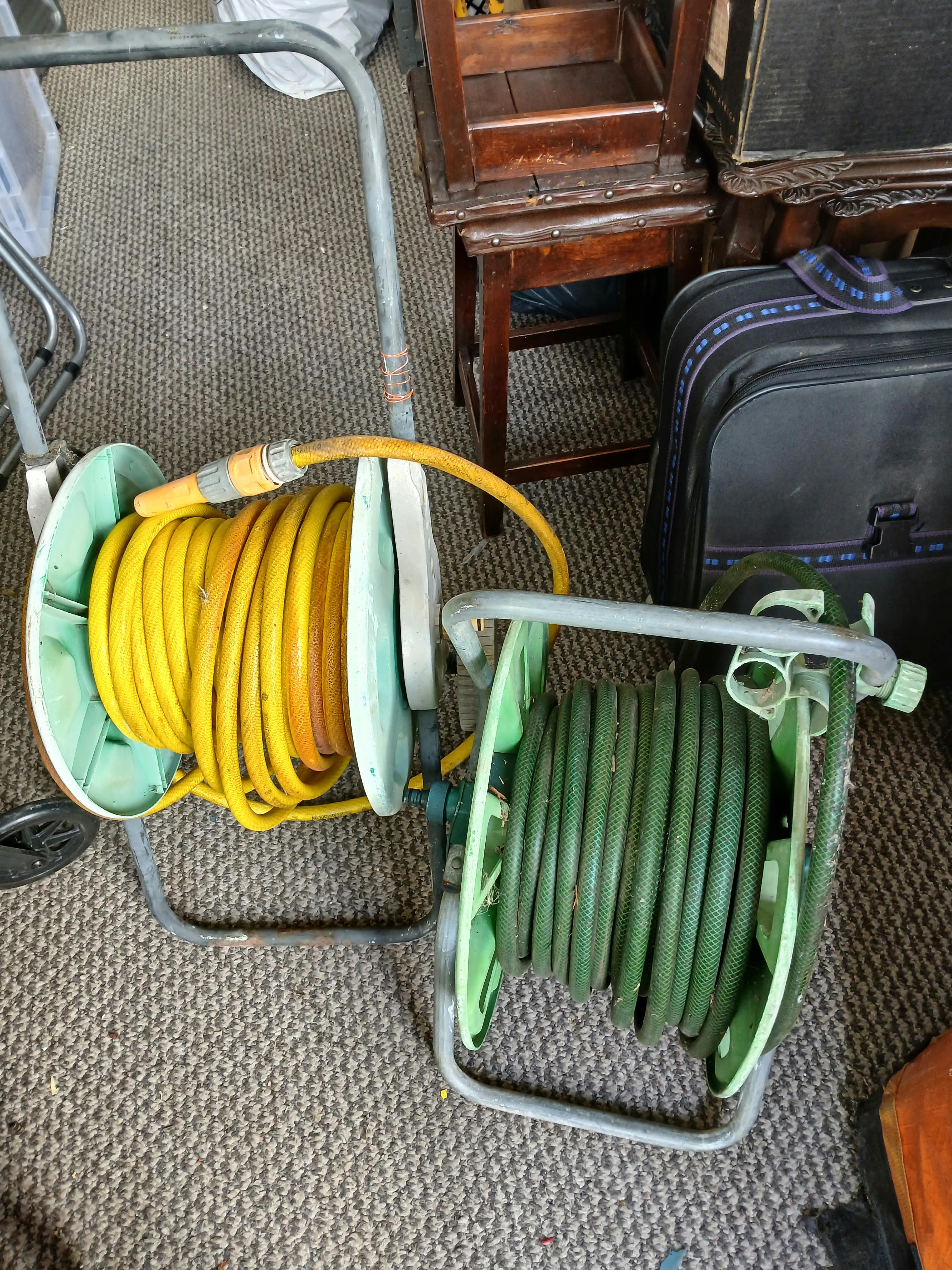 Two Tubular Metal and Plastic Garden Hose Reels?