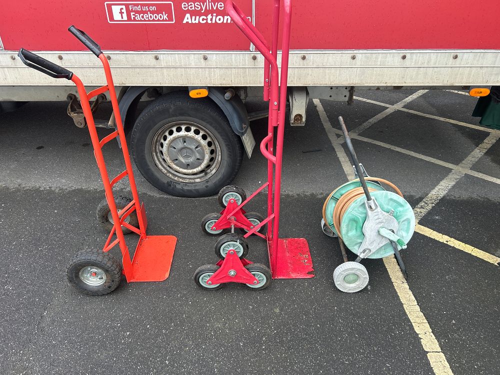 Lot 45: A Group of Steel Hand Trucks and a Garden Hose Reel