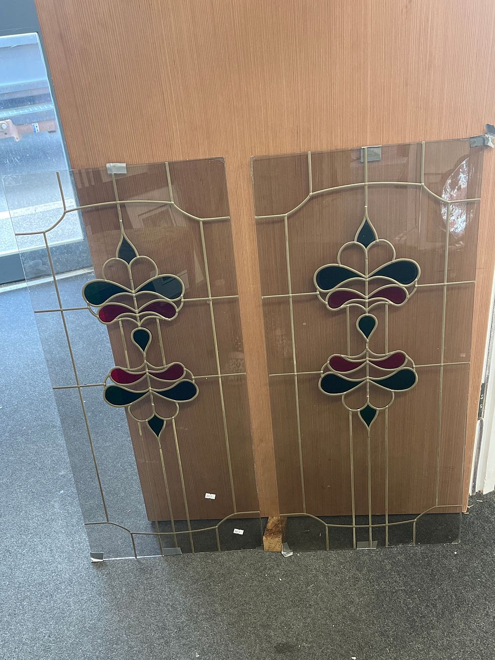 Lot 50: A Pair of Art Nouveau Style Decorative Glass Panels, 35 x 15.5"