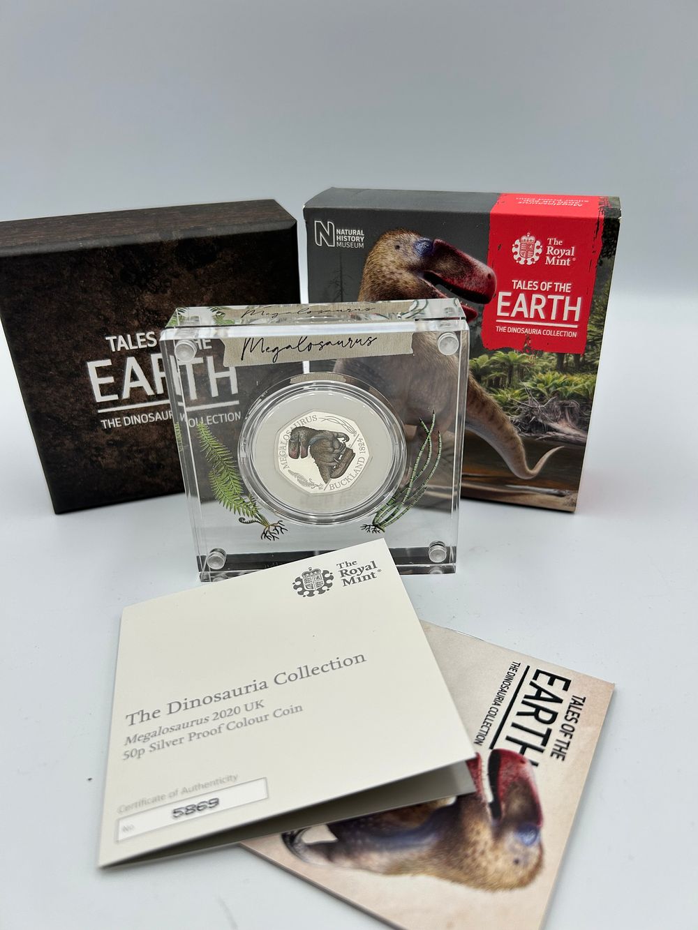 Lot 53: The Royal Mint Silver Tales of the Earth Megalosaurus Proof 50p Coin 2020