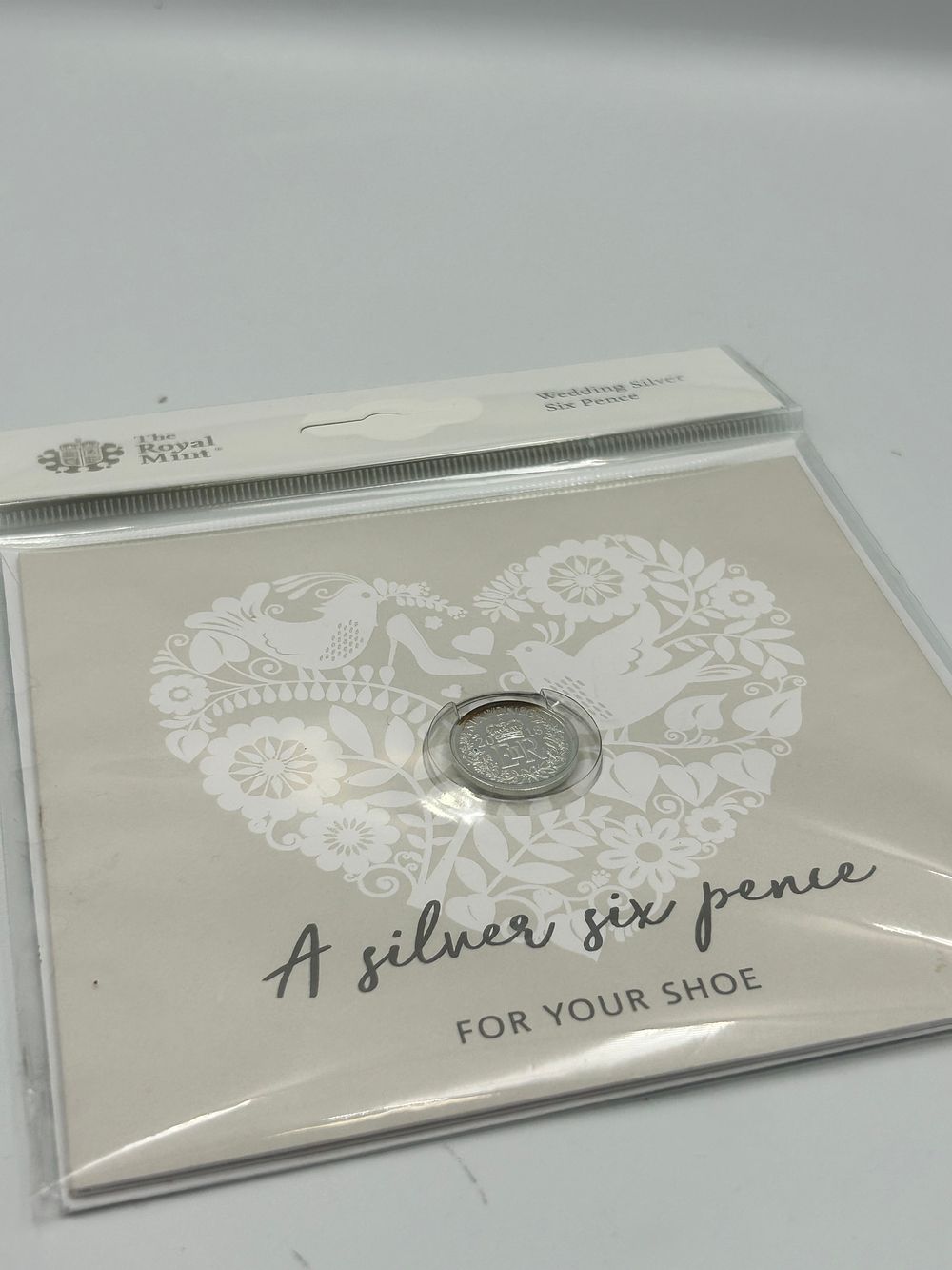 Lot 72: The Royal Mint Sterling Silver? Wedding Sixpence, 2013