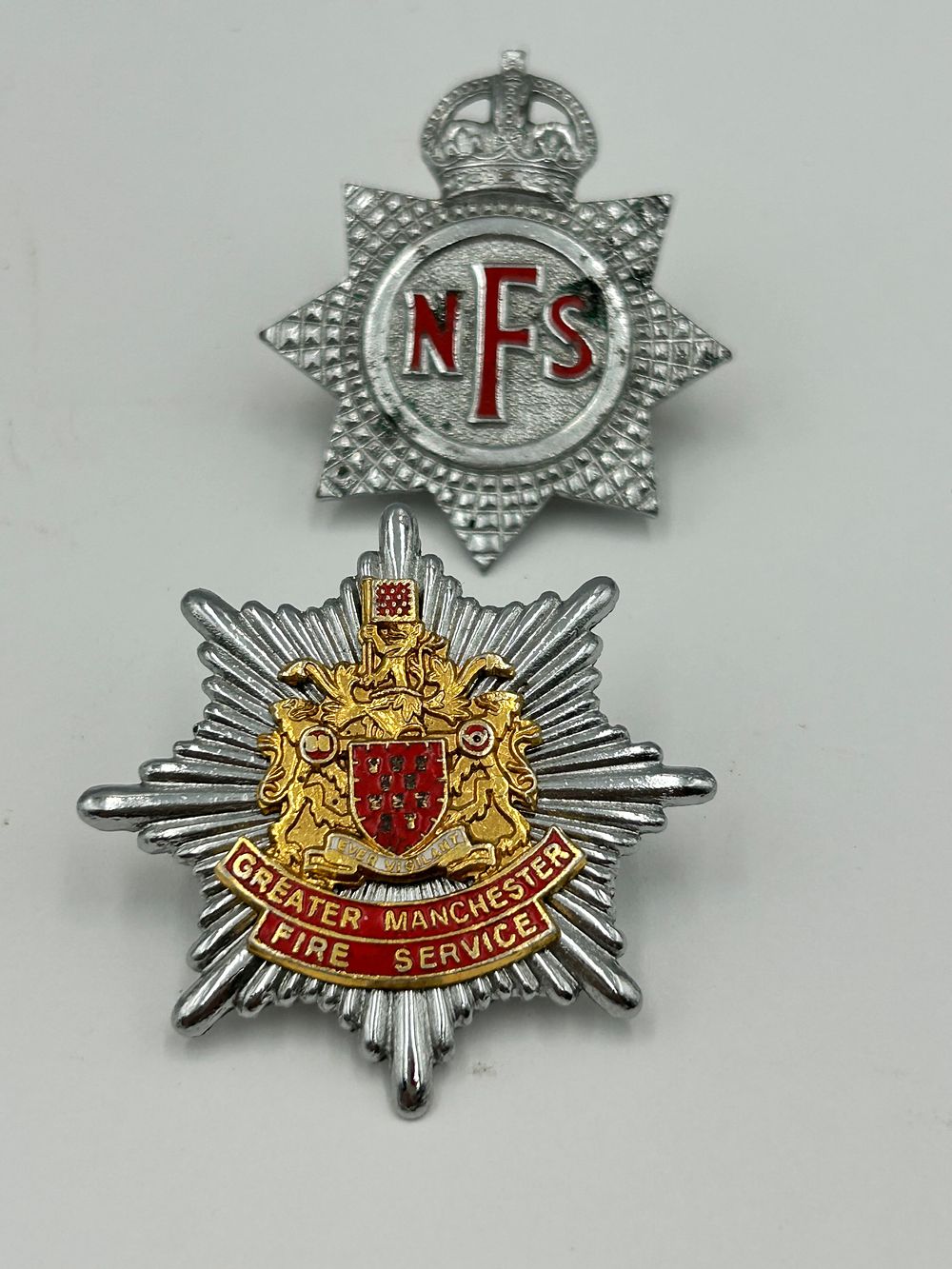 Lot 87: Two White Metal and Enamel Fire Service Cap Badges