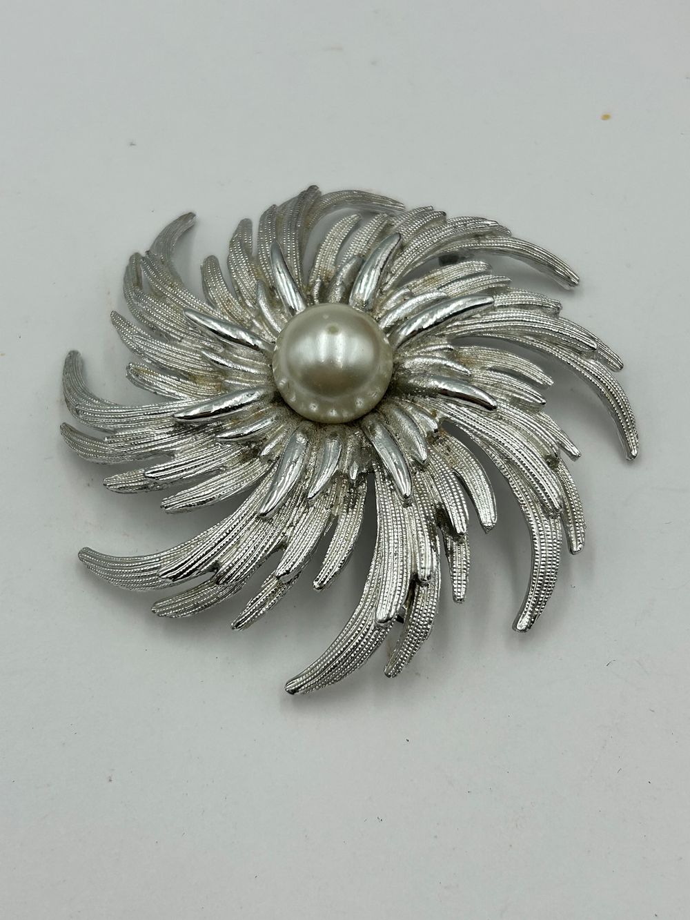 Lot 96: Sarah Coventry White Metal Radiant Swirl Brooch