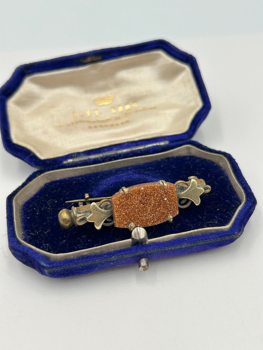 Lot 104: Victorian Gold? Goldstone Nanny Brooch / Needle Case by Alex. Laing?