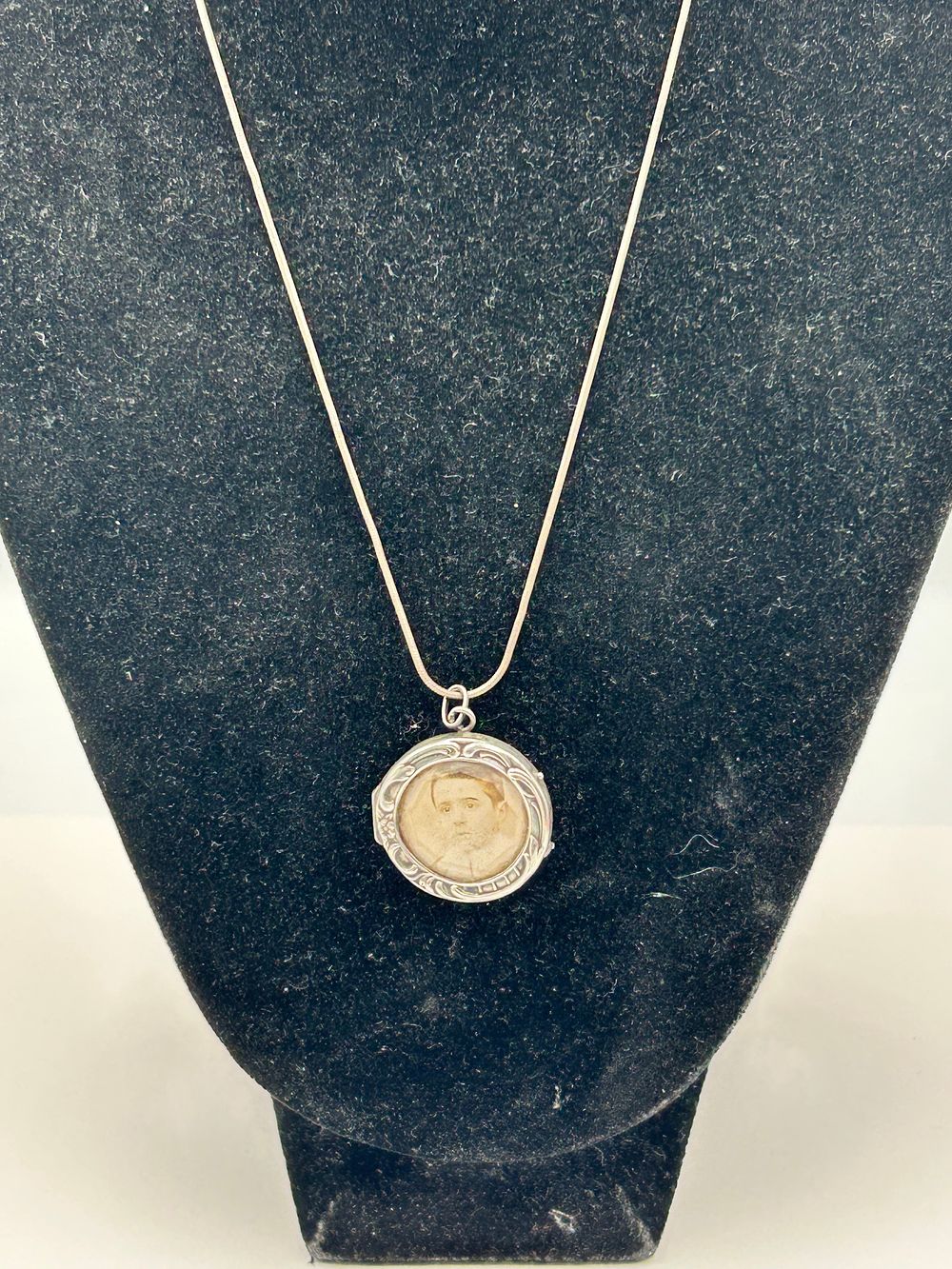 Lot 110: Vintage White Metal Circular Double Sided Locket Pendant on Chain?