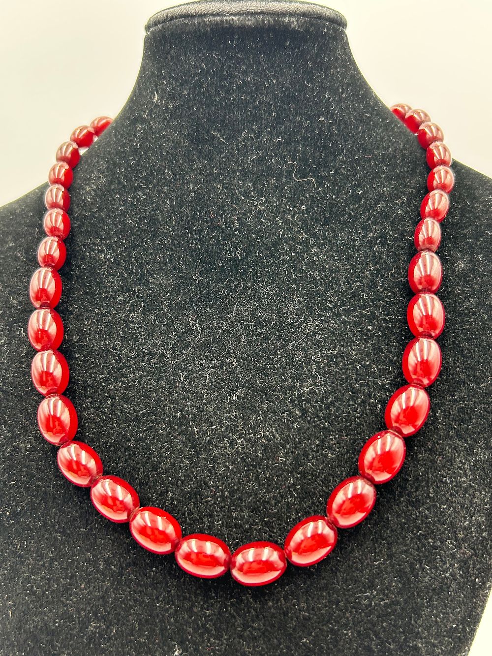 Lot 123: Vintage Graduated Cherry Bakelite / Phenolic Resin? Bead Necklace