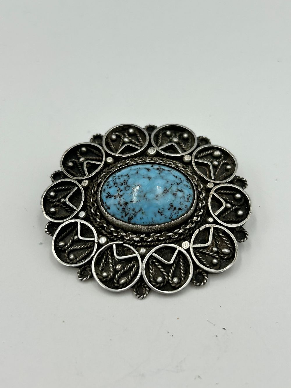 Lot 137: Mid-20th Century 935 Silver Filigree and Turquoise? Pendant Brooch, Made in Israel