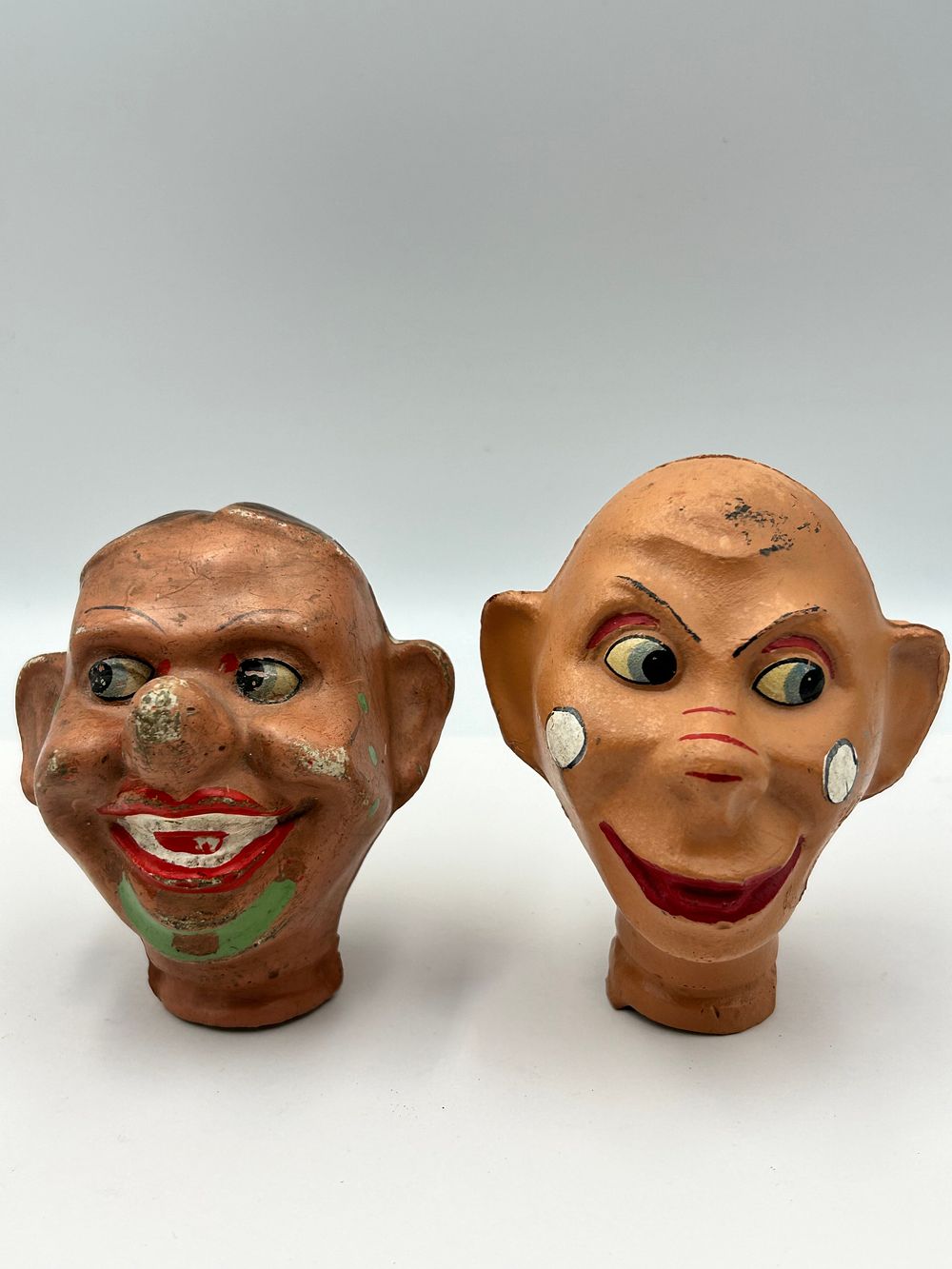 Lot 139: A Pair of European? Composition Puppet Heads