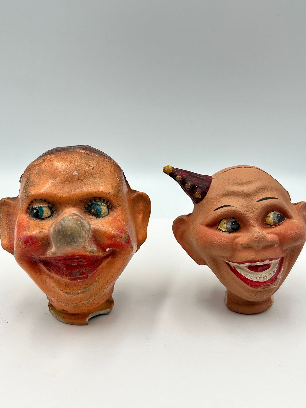 Lot 140: A Pair of Mid-20th Century Composition Hand-Puppet Heads?