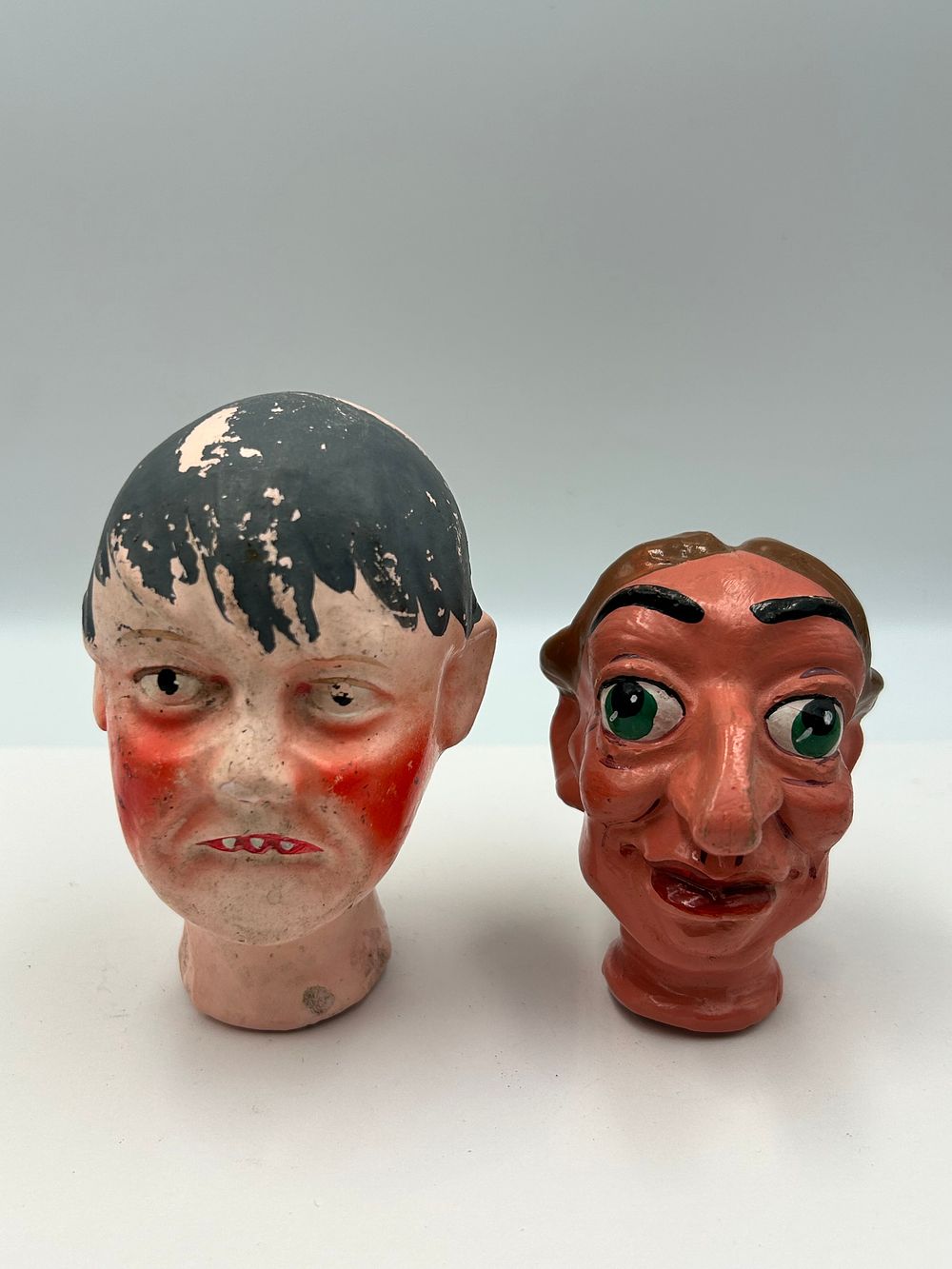 Lot 144: A Pair of Mid-20th Century? Composition Hand Puppet Heads, 4"