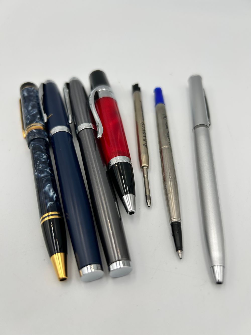 Lot 166: Visconti and Parker? Metal and Marbled Resin Writing Instruments