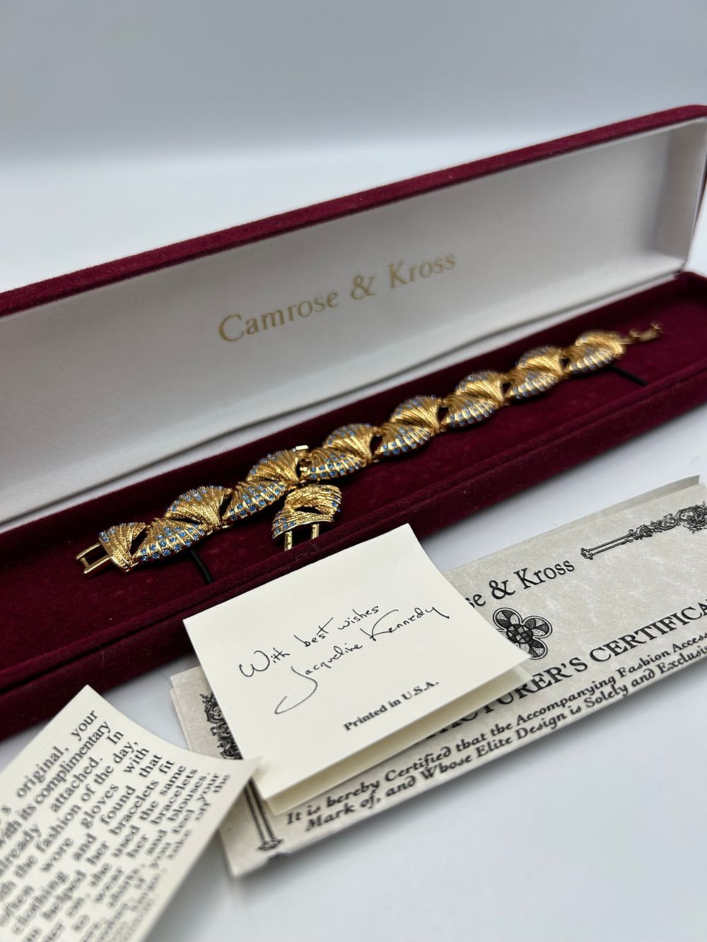 Lot 169: Camrose & Kross Jacqueline Kennedy Collection Gilt Metal Effect and Blue Crystal Bracelet