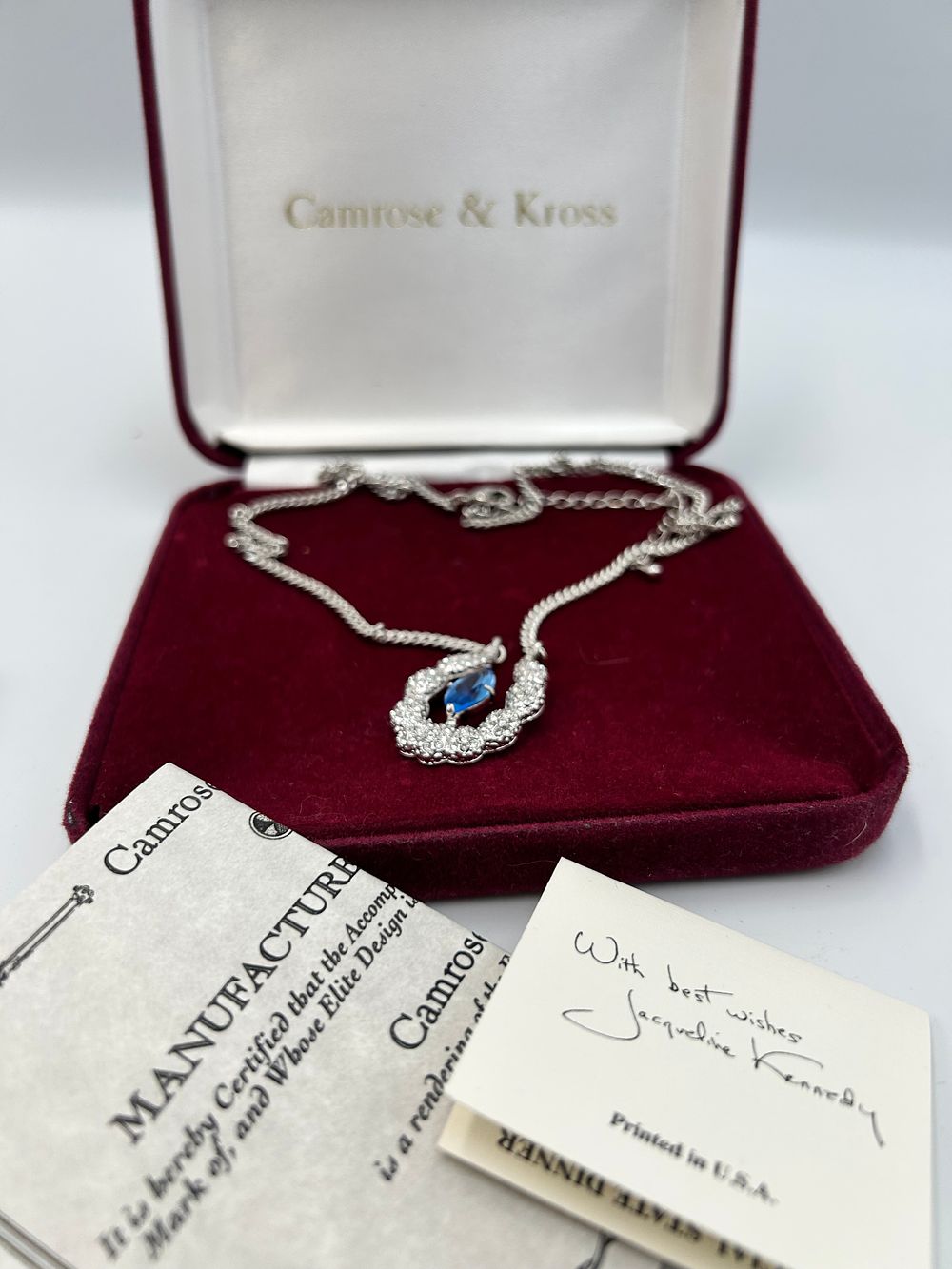 Lot 183: Camrose & Kross The Jacqueline Kennedy Collection White Metal and Blue Crystal Pendant Necklace