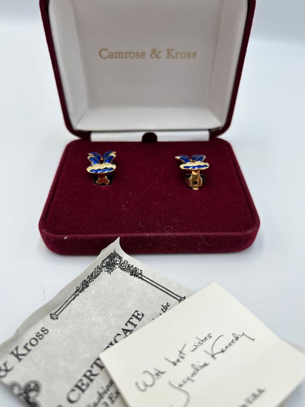 Lot 192: Camrose & Kross Jacqueline Kennedy Collection Gilt Metal Effect and Enamel Clip-on Earrings