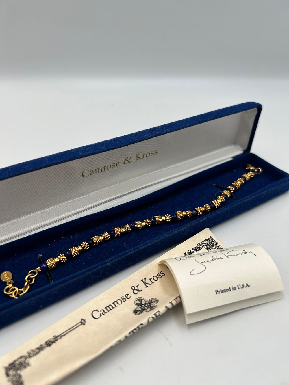 Lot 194: Camrose & Kross Jacqueline Kennedy Collection Lapis Lazuli? and Gilt Metal Effect Bracelet