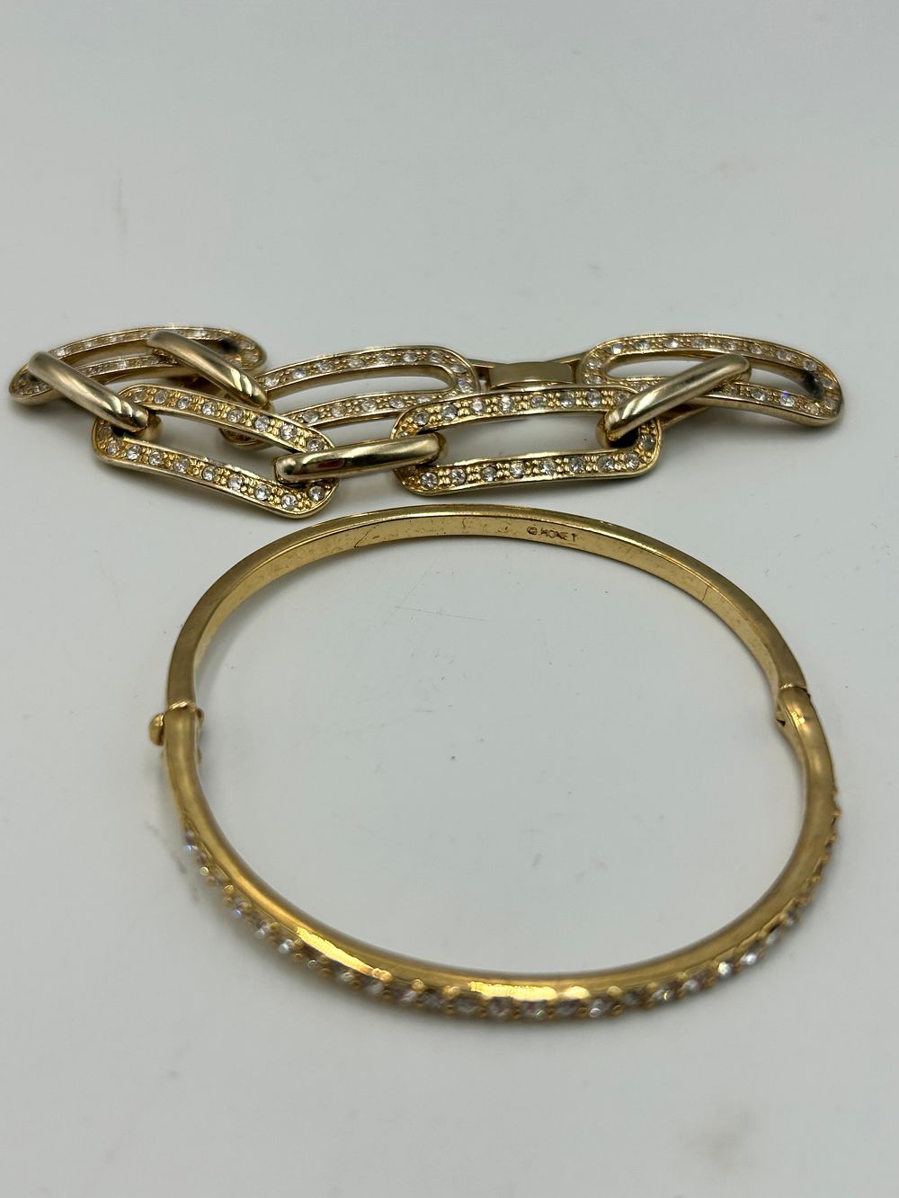 Lot 200: Monet Gilt Metal Effect and Pavé Set Crystal Link and Bangle Bracelet