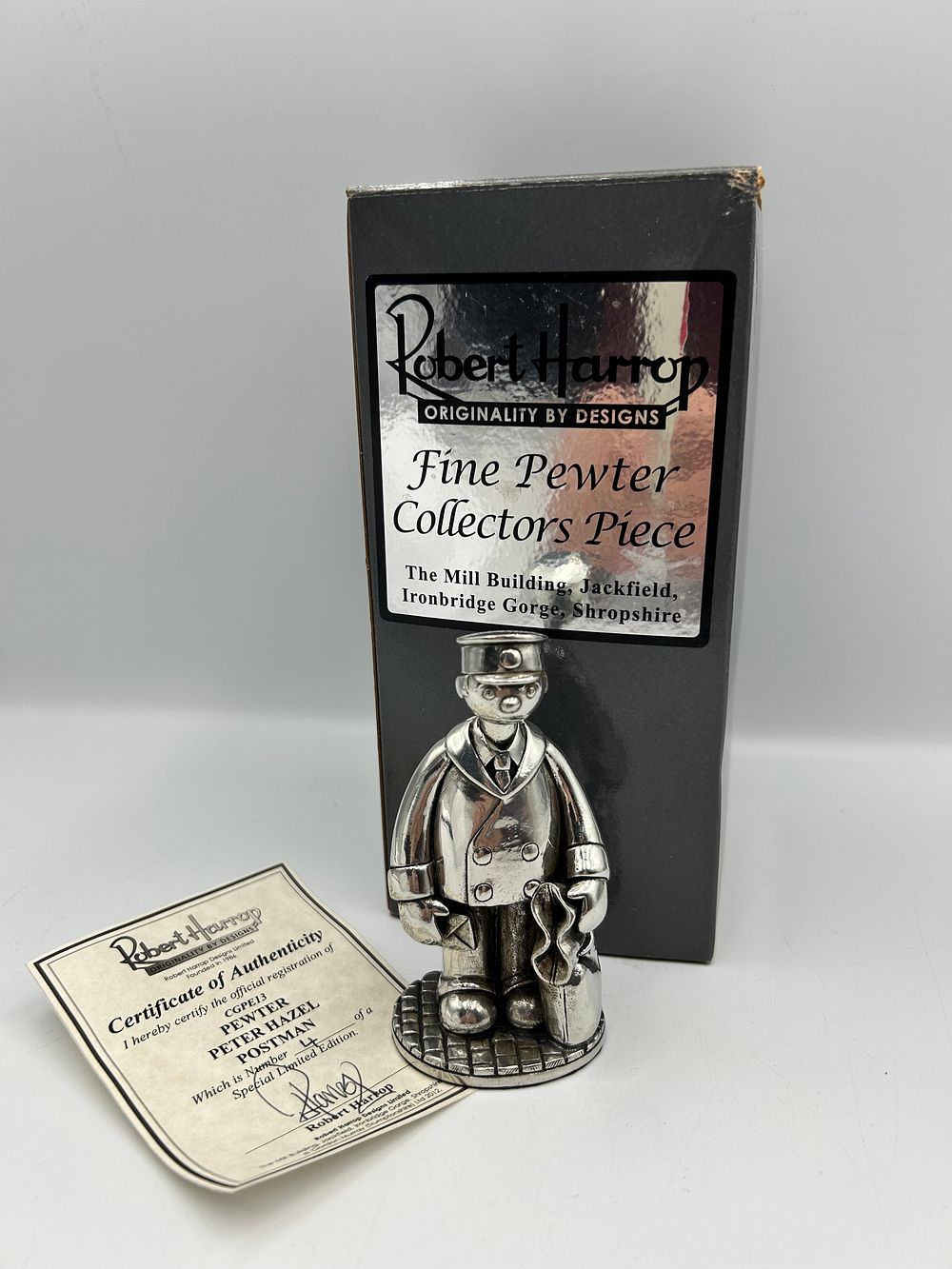 Lot 208: Robert Harrop Designs Ltd Peter Hazel Postman Pewter Figure, CGPE13, 2012