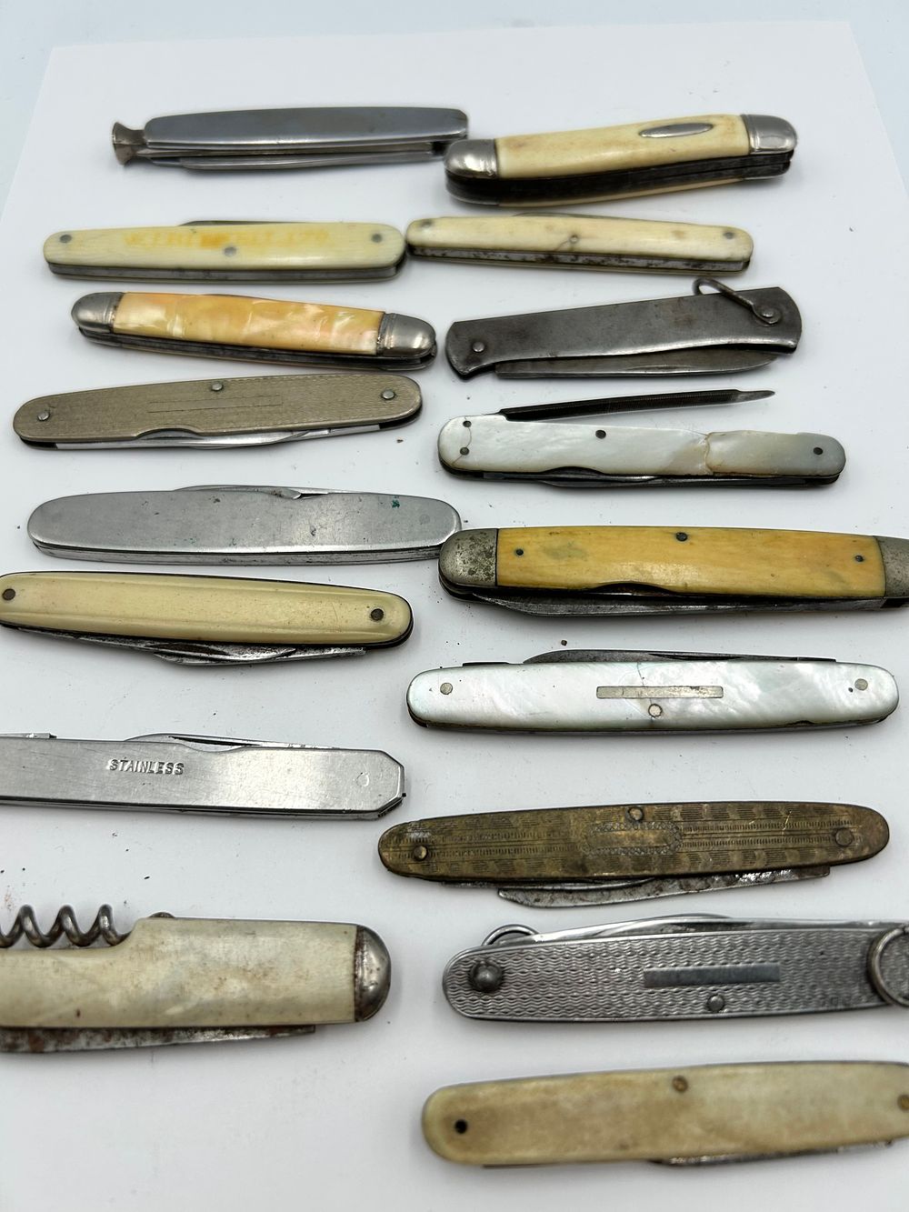 Lot 232: A Collection of Vintage Mother-of-Pearl and Bovine Bone? Folding Pocket Knives