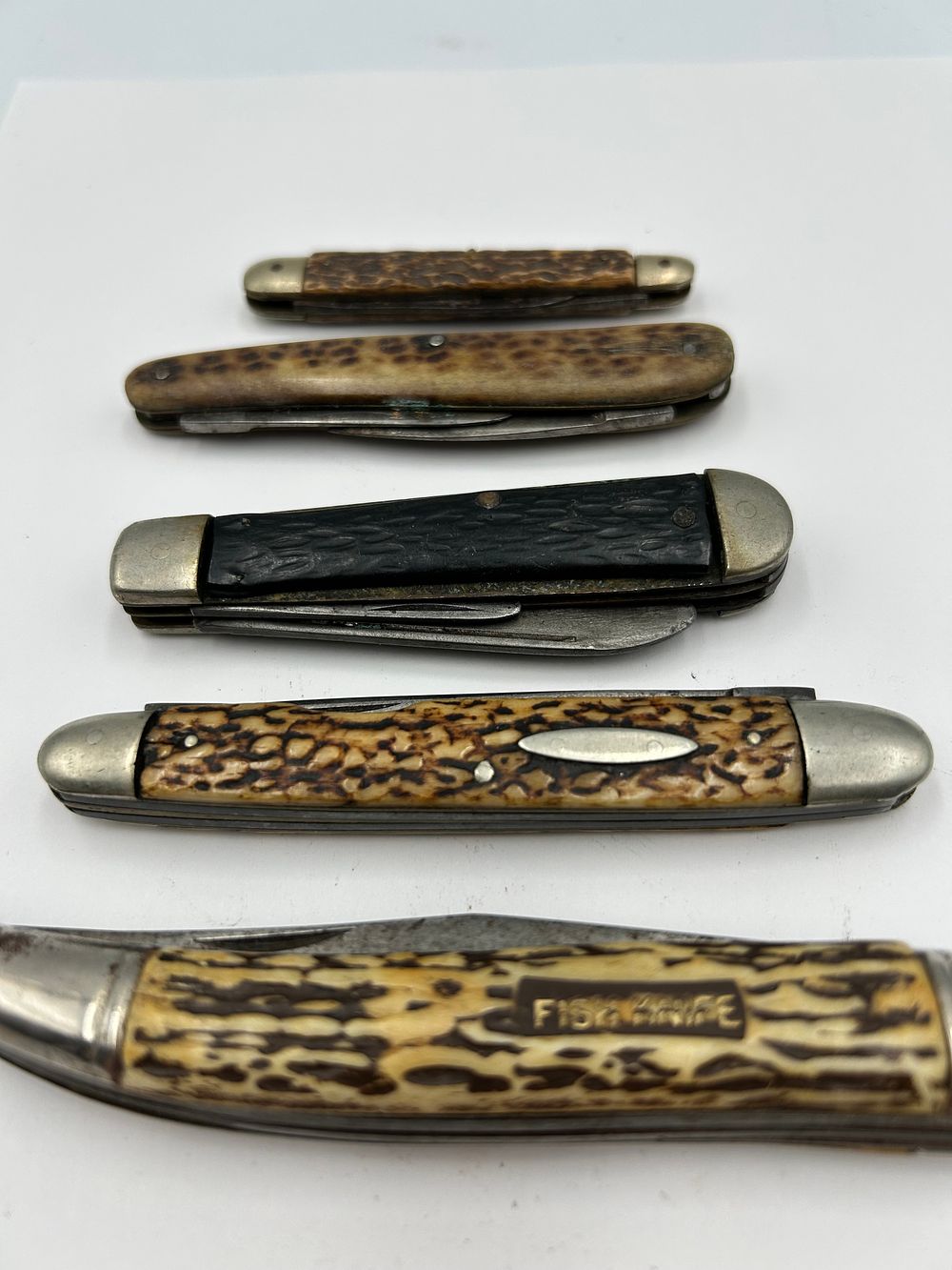 Lot 237: A Collection of Vintage Folding Pocket Knives Including Fish Knife?